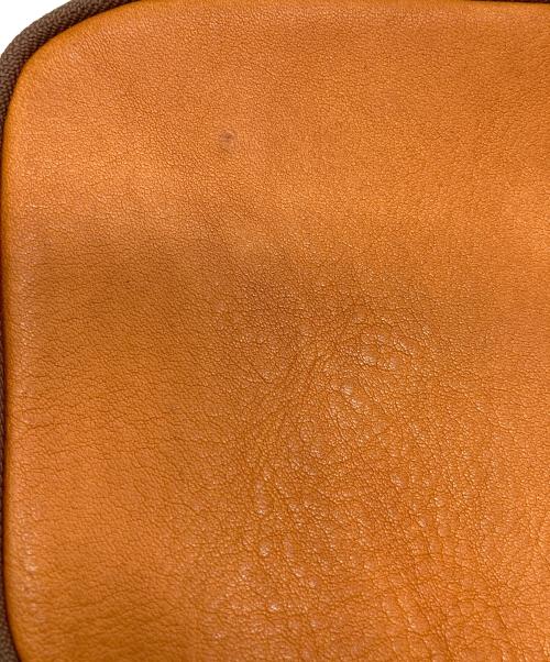 SLOW and HANDS（スロウアンドハンズ）SLOW and HANDS (スロウアンドハンズ) レザーポーチ ブラウンの古着・服飾アイテム