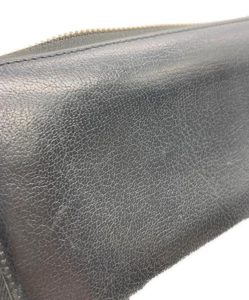 Yves Saint Laurent（イヴサンローラン）Yves Saint Laurent (イヴサンローラン) ラウンドジップウォレット ブラックの古着・服飾アイテム