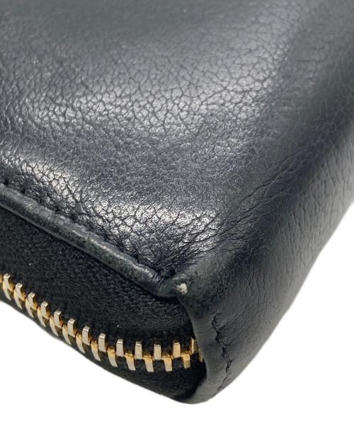 Yves Saint Laurent（イヴサンローラン）Yves Saint Laurent (イヴサンローラン) ラウンドジップウォレット ブラックの古着・服飾アイテム