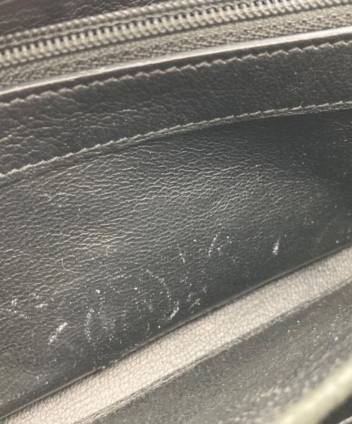 Yves Saint Laurent（イヴサンローラン）Yves Saint Laurent (イヴサンローラン) ラウンドジップウォレット ブラックの古着・服飾アイテム