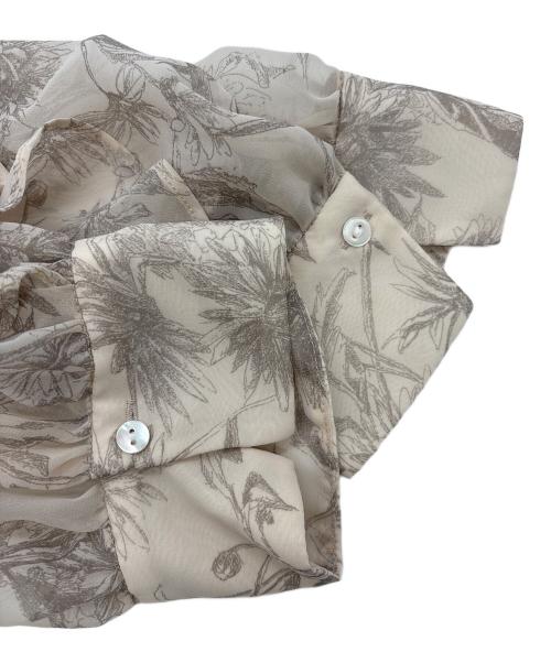 Snidel（スナイデル）Snidel (スナイデル) フリルプリーツプリントワンピース アイボリーの古着・服飾アイテム