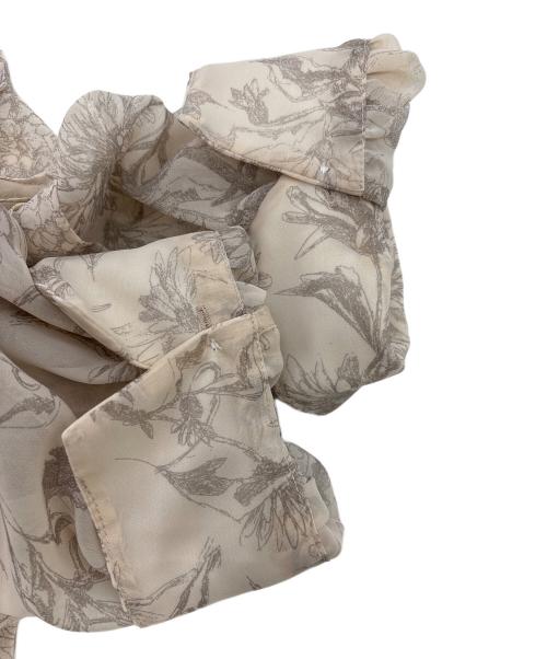 Snidel（スナイデル）Snidel (スナイデル) フリルプリーツプリントワンピース アイボリーの古着・服飾アイテム