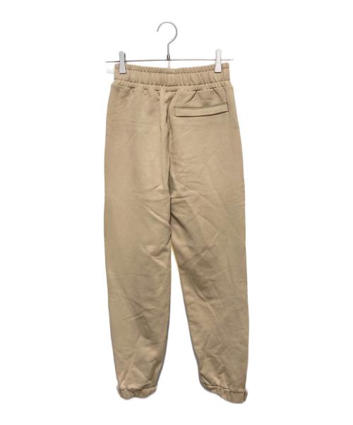 PUMA（プーマ）PUMA (プーマ) maison kitsune (メゾンキツネ) コラボスウェットパンツ ベージュ サイズ:XS 未使用品の古着・服飾アイテム