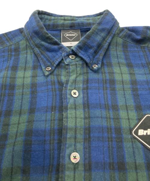 F.C.R.B.（エフシーレアルブリストル）F.C.R.B. (エフシーレアルブリストル) バックプリントチェックネルシャツ グリーン×ネイビー サイズ:XLの古着・服飾アイテム