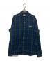 F.C.R.B.（エフシーレアルブリストル）の古着「バックプリントチェックネルシャツ」｜グリーン×ネイビー