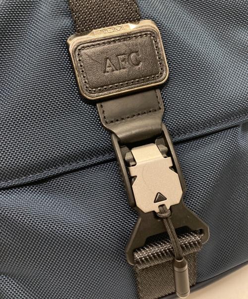 TUMI（トゥミ）TUMI (トゥミ) ジュニアクロスボディショルダーバッグ ネイビーの古着・服飾アイテム