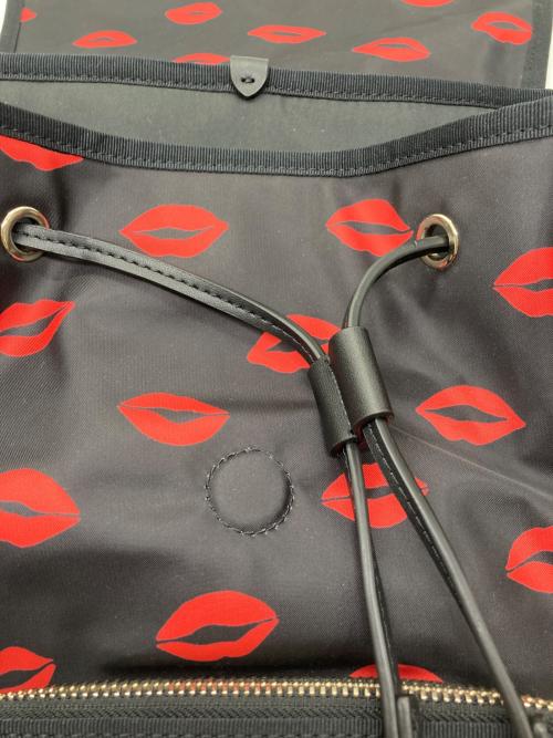 Kate Spade（ケイトスペード）Kate Spade (ケイトスペード) リップバックパック ブラック×レッドの古着・服飾アイテム