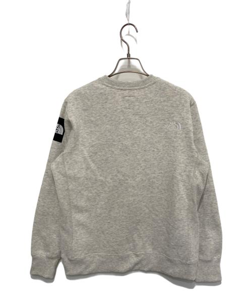 THE NORTH FACE（ザ ノース フェイス）THE NORTH FACE (ザ ノース フェイス) スクエアロゴクルー アイボリー サイズ:Ｍの古着・服飾アイテム