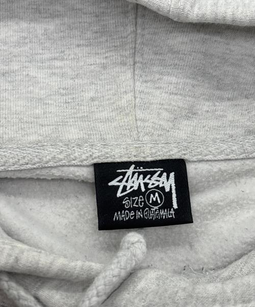 stussy（ステューシー）stussy (ステューシー) バックビッグロゴプルオーバーパーカー グレー サイズ:Mの古着・服飾アイテム