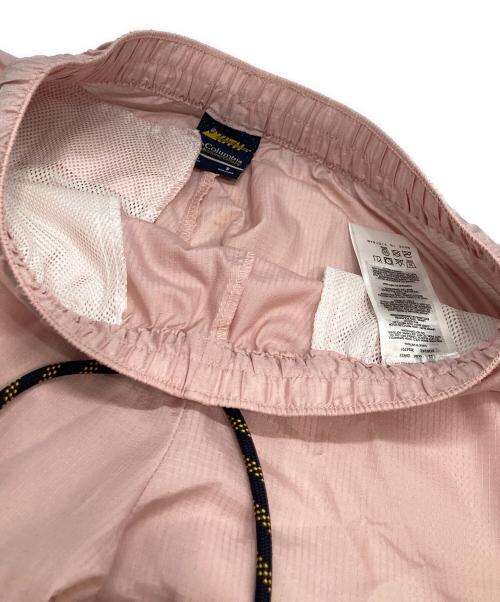 KITH（キス）KITH (キス) Columbia (コロンビア) コラボナイロンパンツ ピンク×ホワイト サイズ:Sの古着・服飾アイテム
