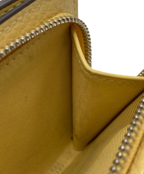 COACH（コーチ）COACH (コーチ) PEANUTS (ピーナッツ) スナップウォレット・チャーリー・ブラウン イエローの古着・服飾アイテム