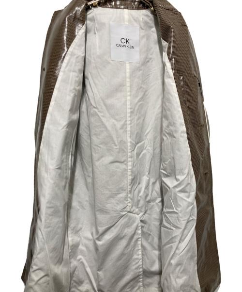 Calvin Klein（カルバンクライン）Calvin Klein (カルバンクライン) ラミネート加工ステンカラーコート ベージュ サイズ:36 未使用品の古着・服飾アイテム
