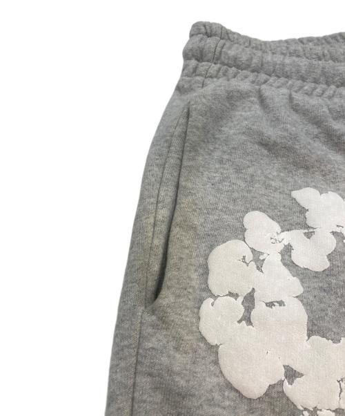 READYMADE（レディメイド）READYMADE (レディメイド) Denim Tears (デニムティアーズ) フラワープリントスウェットパンツ グレー サイズ:Lの古着・服飾アイテム