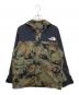 THE NORTH FACE（ザ ノース フェイス）の古着「ノベルティマウンテンライトジャケット」｜オリーブ