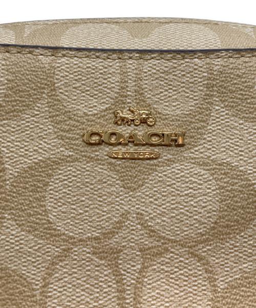 COACH（コーチ）COACH (コーチ) ミニカメラ ショルダーバッグ アイボリー×ベージュの古着・服飾アイテム