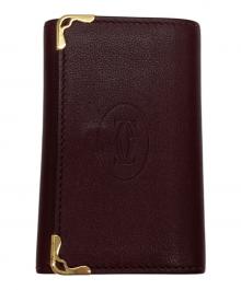 Cartier（カルティエ）の古着「マスト ドゥ カルティエ 6連キーケース」｜バーガンディー