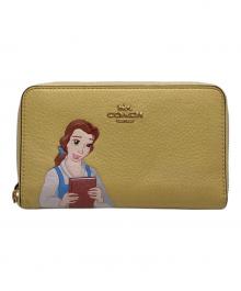 COACH×DISNEY（コーチ×ディズニー）の古着「ラウンドファスナー長財布」｜イエロー