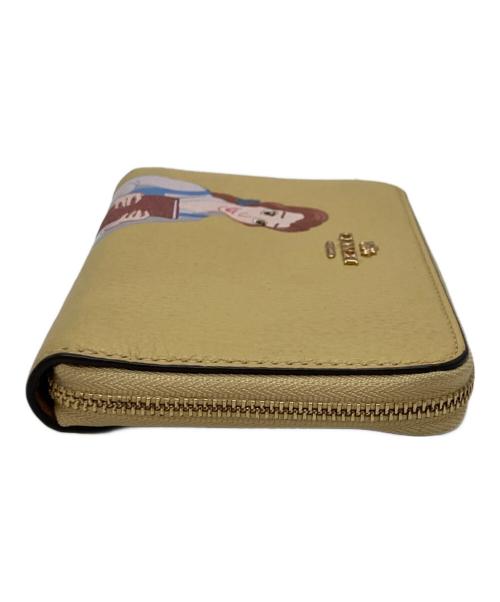 COACH（コーチ）COACH (コーチ) Disney (ディズニー) ラウンドファスナー長財布 イエローの古着・服飾アイテム