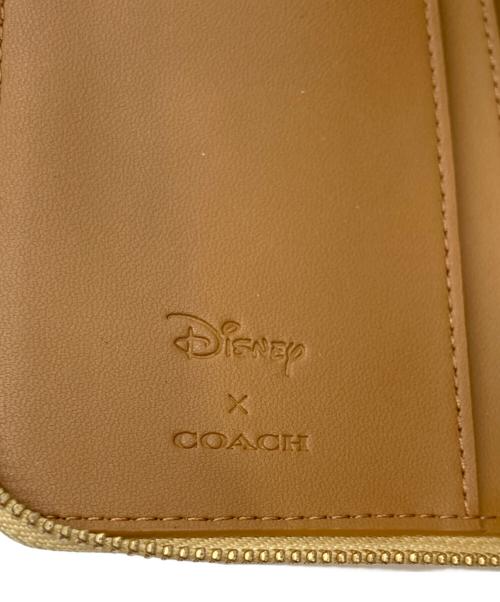 COACH（コーチ）COACH (コーチ) Disney (ディズニー) ラウンドファスナー長財布 イエローの古着・服飾アイテム