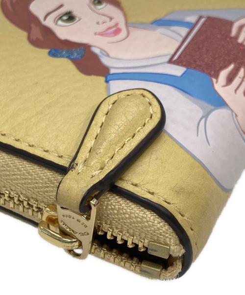 COACH（コーチ）COACH (コーチ) Disney (ディズニー) ラウンドファスナー長財布 イエローの古着・服飾アイテム