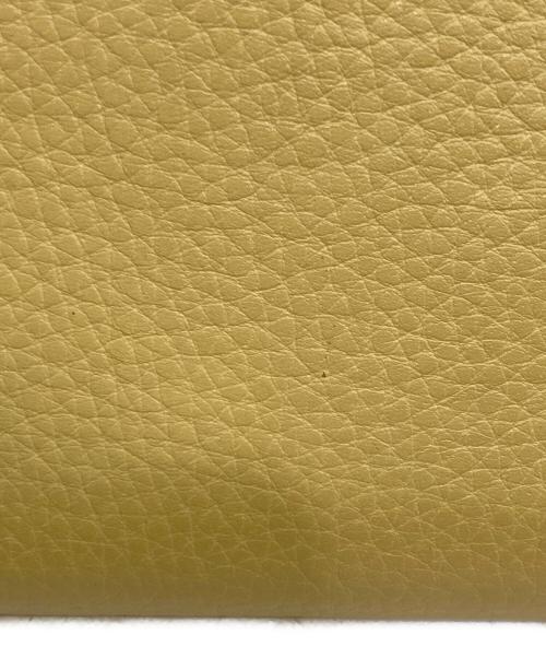 COACH（コーチ）COACH (コーチ) Disney (ディズニー) ラウンドファスナー長財布 イエローの古着・服飾アイテム