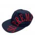 Supreme（シュプリーム）の古着「SIDE ARC 6-PANEL CAP」｜ネイビー×レッド