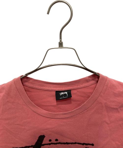 stussy（ステューシー）stussy (ステューシー) プリントTシャツ ピンク サイズ:Lの古着・服飾アイテム