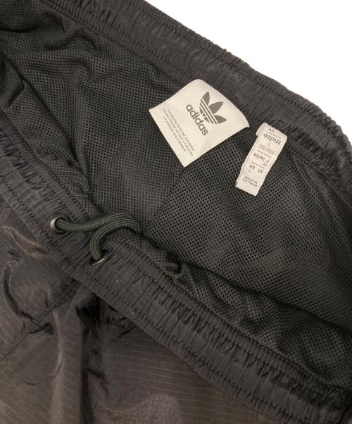 adidas（アディダス）adidas (アディダス) アディカラー 2000s ウーブントラックパンツ ブラック サイズ:Lの古着・服飾アイテム