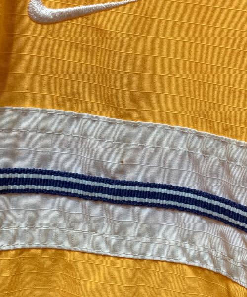 NIKE（ナイキ）NIKE (ナイキ) リップストップ アノラックパーカー イエロー サイズ: M(8-10)の古着・服飾アイテム