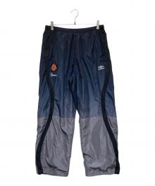 SUPREME×UMBRO（シュプリーム×アンブロ）の古着「Gradient Track Pant」｜ネイビー×グレー