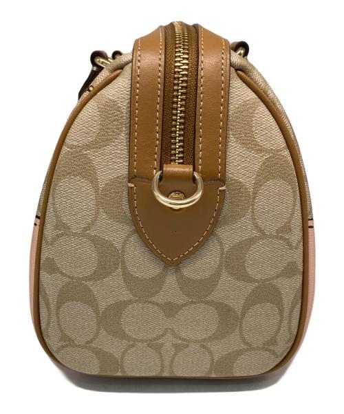 COACH（コーチ）COACH (コーチ) ローワン サッチェル トロンプルイユ プリント2WAYバッグ ベージュの古着・服飾アイテム