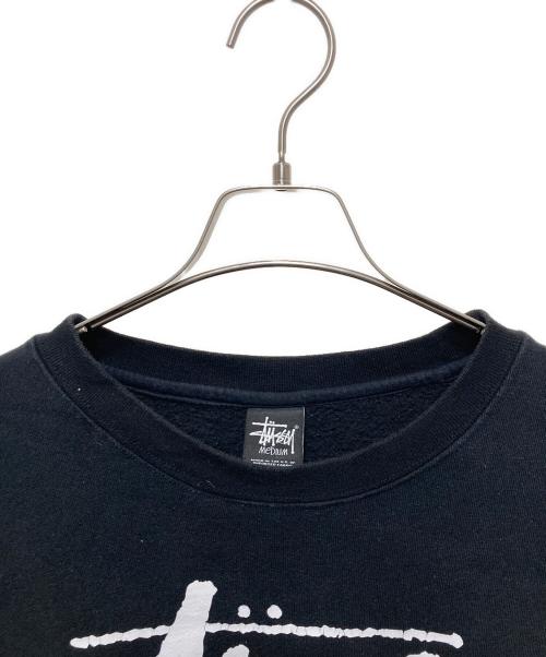 stussy（ステューシー）stussy (ステューシー) ワールドツアープリントスウェット ブラック サイズ:Ⅿの古着・服飾アイテム