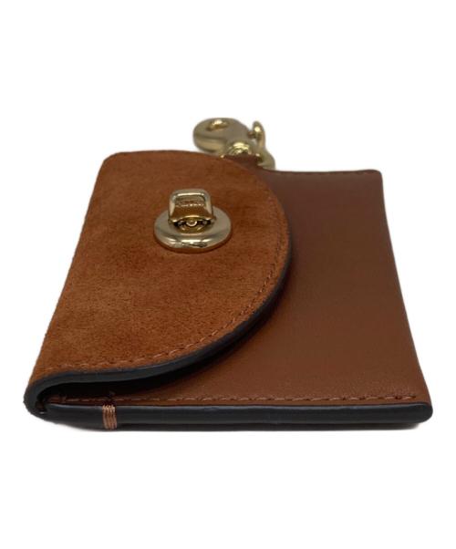 COACH（コーチ）COACH (コーチ) ターンロック小銭入れ ブラウンの古着・服飾アイテム