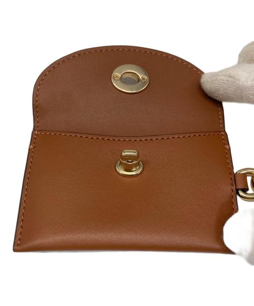 COACH（コーチ）COACH (コーチ) ターンロック小銭入れ ブラウンの古着・服飾アイテム