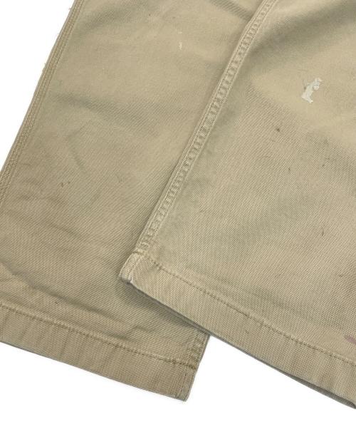 CarHartt（カーハート）CarHartt (カーハート) ペイント加工ワークパンツ ベージュ サイズ:34×32の古着・服飾アイテム