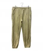 stussyステューシー）の古着「Sロゴナイロントラックパンツ」｜ベージュ