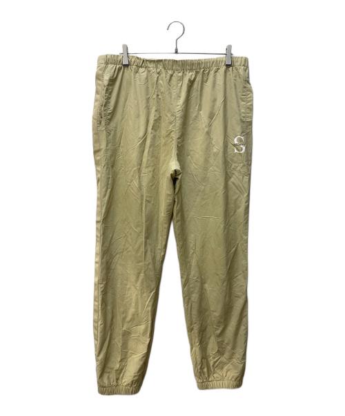 stussy（ステューシー）stussy (ステューシー) Sロゴナイロントラックパンツ ベージュ サイズ:XLの古着・服飾アイテム