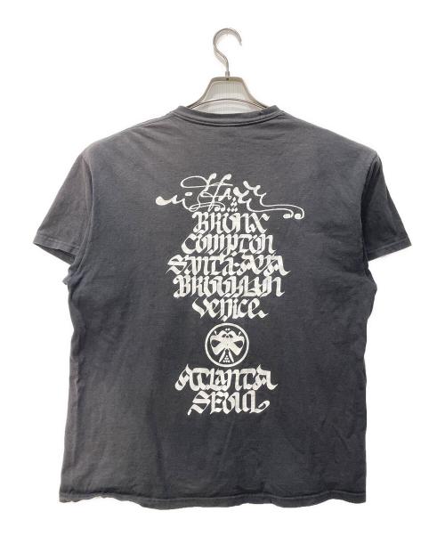 stussy（ステューシー）stussy (ステューシー) ROSTARRWORLD TOUR TEE ブラック サイズ:XLの古着・服飾アイテム