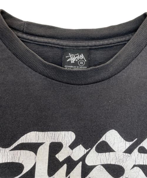 stussy（ステューシー）stussy (ステューシー) ROSTARRWORLD TOUR TEE ブラック サイズ:XLの古着・服飾アイテム