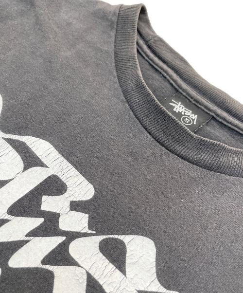 stussy（ステューシー）stussy (ステューシー) ROSTARRWORLD TOUR TEE ブラック サイズ:XLの古着・服飾アイテム