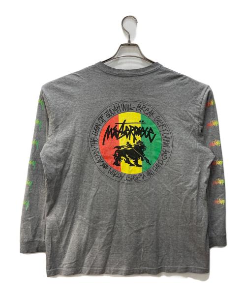 stussy（ステューシー）stussy (ステューシー) ラスタライオンプリント長袖Tシャツ グレー サイズ:XLの古着・服飾アイテム