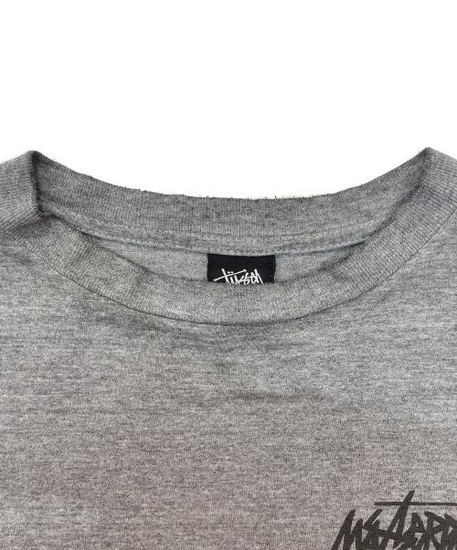 stussy（ステューシー）stussy (ステューシー) ラスタライオンプリント長袖Tシャツ グレー サイズ:XLの古着・服飾アイテム