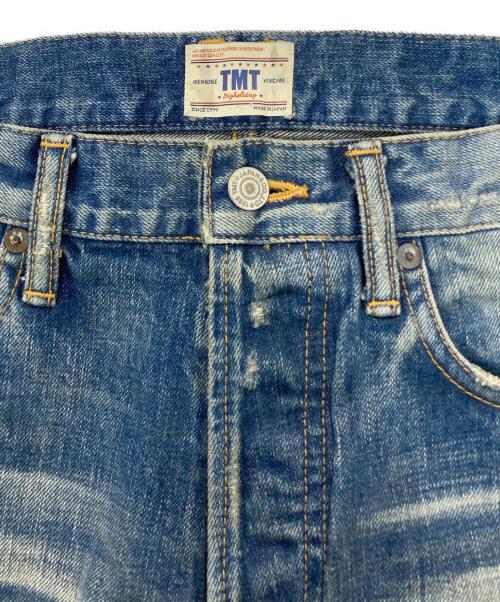 TMT（ティーエムティー）TMT (ティーエムティー) ワッペン付きセルビッチデニムパンツ インディゴ サイズ:Mの古着・服飾アイテム