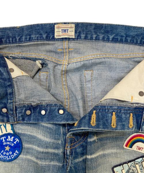 TMT（ティーエムティー）TMT (ティーエムティー) ワッペン付きセルビッチデニムパンツ インディゴ サイズ:Mの古着・服飾アイテム