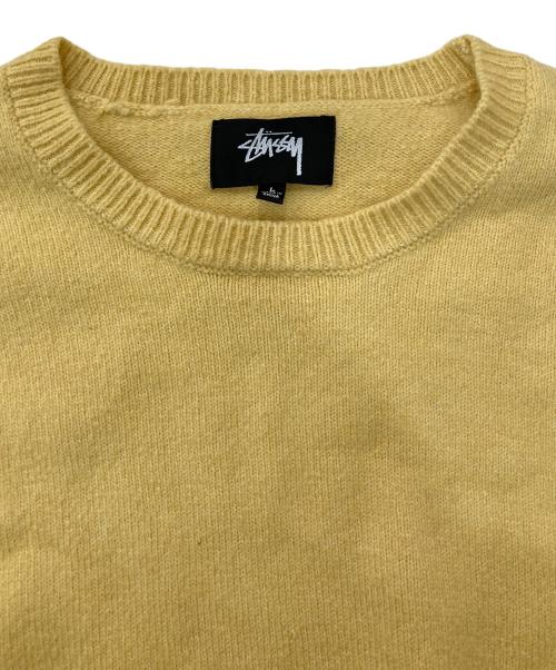 stussy（ステューシー）stussy (ステューシー) ロゴプリントニット イエロー サイズ:Lの古着・服飾アイテム