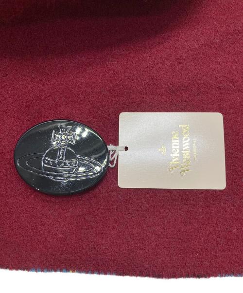 Vivienne Westwood（ヴィヴィアンウエストウッド）Vivienne Westwood (ヴィヴィアンウエストウッド) リバーシブルポンチョ風マフラー レッドの古着・服飾アイテム