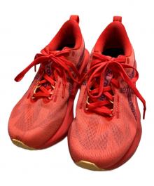 asics（アシックス）の古着「ランニングシューズ」｜レッド