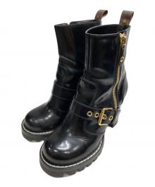 LOUIS VUITTON（ルイ ヴィトン）の古着「スタートレイルアンクルブーツ」｜ブラック