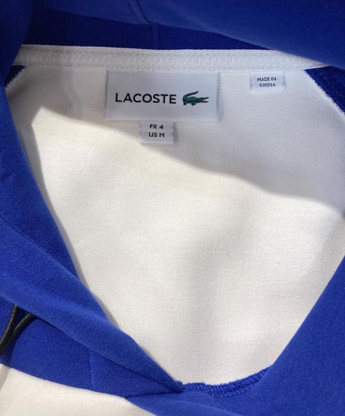 LACOSTE（ラコステ）LACOSTE (ラコステ) バイカラージップポケットスウェットフーディー ブルー サイズ:Mの古着・服飾アイテム