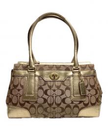 COACH（コーチ）の古着「シグネチャーハンドバッグ」｜イエロー